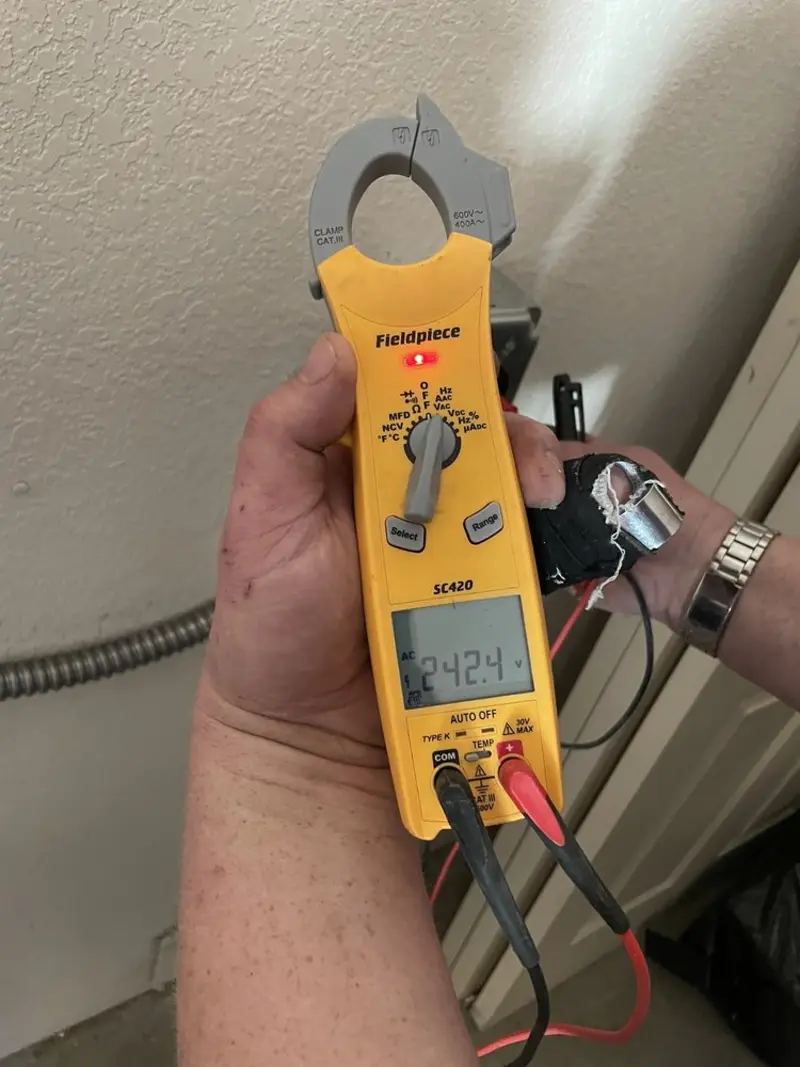 Voltage testing with clamp meter during Generator Installation in Winter Springs